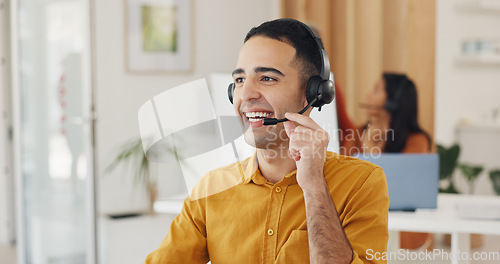 Image of Call center, man and happy online consulting in office for CRM questions, FAQ contact and IT support. Telemarketing agent with communication for sales advisory, telecom solution and offer client help