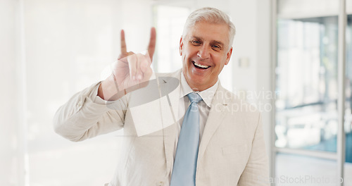 Image of Business, portrait and senior man with rock hands in office happy for ceo, success or motivation, leadership and mindset. Elderly, face and excited male CEO with rocker, emoji or punk with a smile