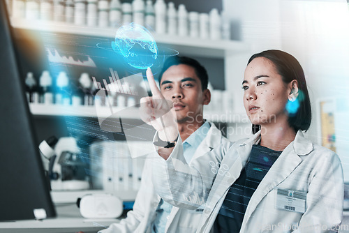 Image of Medical, research and man with woman, hologram and futuristic with chemistry, global and cure development. Holographic, staff or coworkers with cooperation, teamwork or data analytics in a laboratory