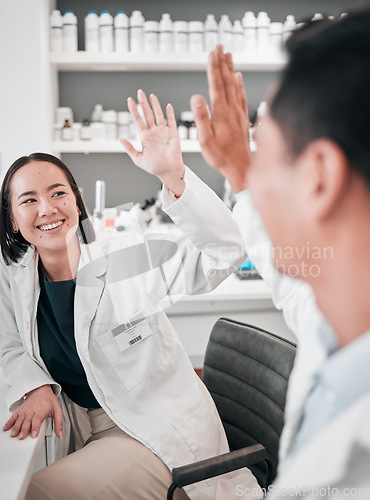 Image of Medical, research and man with woman, high five and science with achievement, teamwork and congratulations. Coworkers, happy scientist and mentor with hand gesture, chemistry and success with support