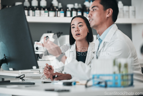 Image of Scientist, teamwork and computer, healthcare analysis or laboratory report, research and training support. Science or medical people talking of vaccine solution, advice and desktop for online results