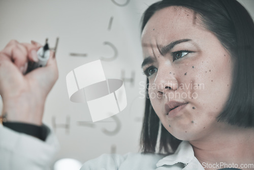 Image of Science, glass board and scientist writing formula with focus face for pharmaceutical analytics and particles study. Research, person and working on laboratory planning and chemical analysis for dna