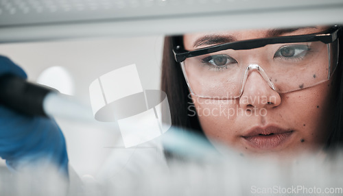 Image of Test tubes, scientist analysis and woman with investigation and science research of an Asian person. Laboratory, professional and healthcare worker with medicine and liquid check for hospital test