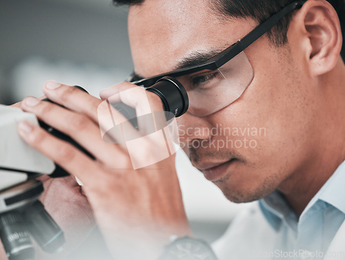 Image of Microscope, face and man in medical laboratory for research, dna analysis or development of science innovation. Asian scientist, biotechnology or check lens for investigation, particles or assessment