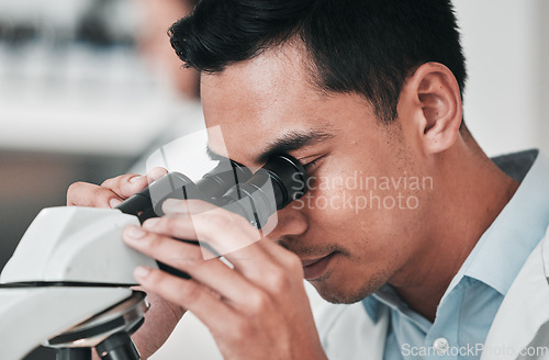 Image of Scientist, man and microscope in laboratory research, DNA analysis and pharmaceutical development or medical study. Professional science person or doctor in biotechnology and lens check of particles