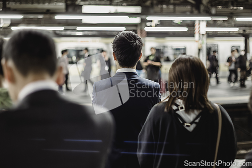 Image of Passengers traveling by Tokyo metro.