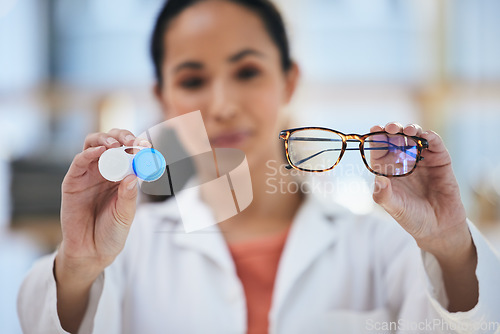 Image of Hands, glasses and contact lens, woman with choice of eye care and help with optometry, vision and healthcare closeup. Doctor, frame and lenses container with decision, advice and ophthalmologist