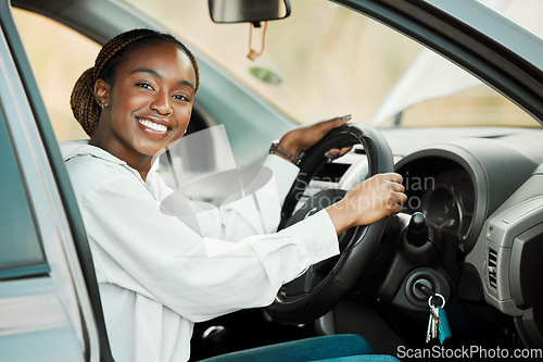 Image of Woman, driving car and portrait in driver seat with license, freedom and travel on road trip. Black female person in automobile, transport or vehicle for test, transportation and excited for journey