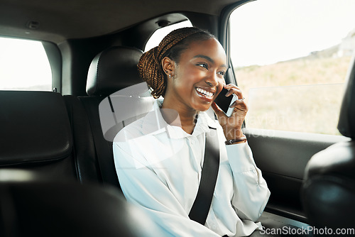 Image of Smile, phone call and a business black woman a taxi for transport or ride share on her commute to work. Mobile, contact and a happy young employee in the backseat of a cab for travel as a passenger