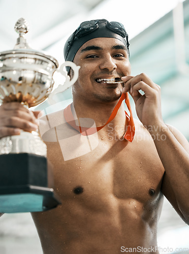 Image of Sports winner, swimming trophy and man portrait with competition success, achievement goal and winning race. Medal, athlete and swimmer with prize, pride and champion bite award at challenge event