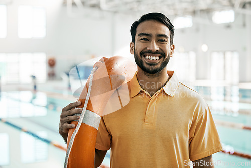 Image of Lifeguard portrait, swimming pool and man with safety and lifebuoy for rescue support, help or life saving. Smile, equipment and first aid expert for protection, security and medical emergency