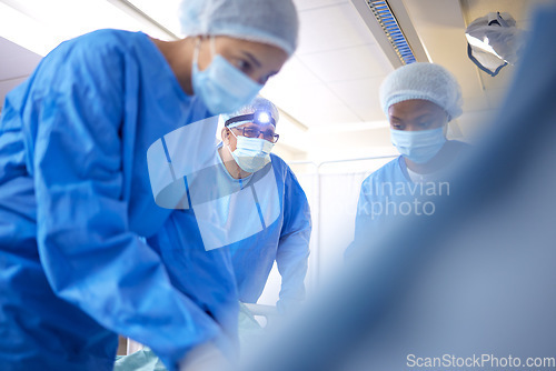 Image of Hospital, surgeon team and doctors for emergency, healthcare or medical procedure. Medicine, group and staff to start collaboration, surgery and operation with support and scrubs in ICU or theatre