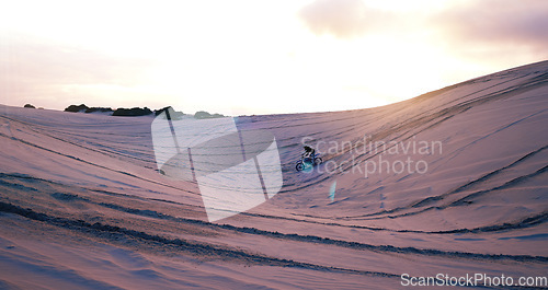 Image of Hill, sand or athlete on motorcycle for adventure, action or fitness with wellness in outdoor workout. Sunset, desert or sports driver on motorbike on dunes in training, exercise or race challenge