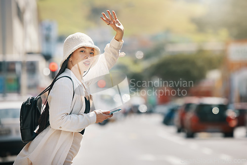 Image of Street, taxi call, and a woman with a phone for contact, an app or communication in the morning. Road, waiting and a girl with a mobile and gesture for transport in city for an urban commute