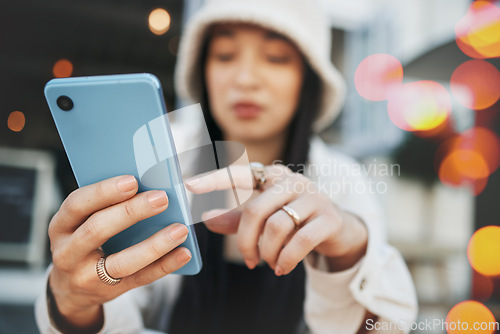 Image of Hands, travel and woman with phone at a cafe for social media, texting or chatting in a city. Smartphone, app and lady influencer at coffee shop for content creation, podcast or traveling blog post