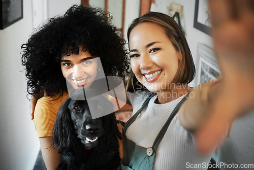 Image of Smile, selfie and portrait of lesbian couple with dog in modern apartment bonding together. Love, happy and interracial young lgbtq women taking a picture and holding animal pet puppy at home.