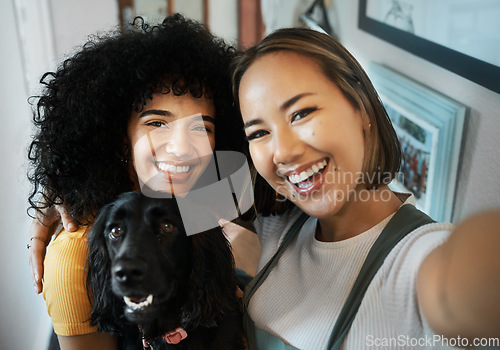Image of Happy, selfie and portrait of lesbian couple with dog in modern apartment bonding together. Love, smile and interracial young lgbtq women taking a picture and holding animal pet puppy at home.