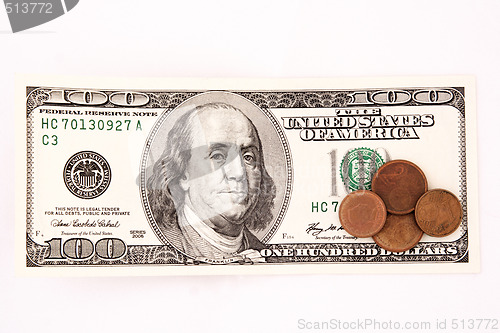 Image of Hundred dollar bill and coins