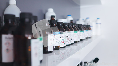 Image of Research, pharmaceutical chemical and bottle on shelf in laboratory with medical warning label, science and cure. Healthcare, medicine and innovation in manufacturing of poison antidote and vaccine