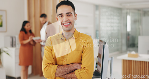 Image of Portrait, smile and business man with arms crossed in office, startup company or creative workplace. Face, happy designer and confident professional, entrepreneur and employee or worker in Brazil.