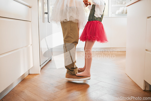 Image of Legs, dance or person teaching kid steps, routine or youth development, ballet or performance. Music, home kitchen or parent helping, support or aid family child, dancer or ballerina learning recital