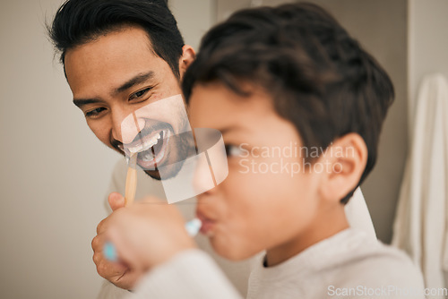 Image of Face of dad, boy and child brushing teeth for hygiene, morning routine or teaching healthy oral habits at home. Happy father, kid and dental cleaning in bathroom with toothbrush, fresh breath or care