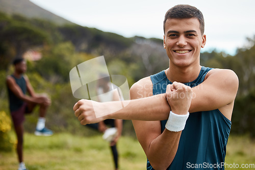 Image of Fitness, stretching and portrait of a man outdoor for health and wellness. Happy runner, athlete or sports person in nature park to start exercise, workout or training with arm muscle warm up