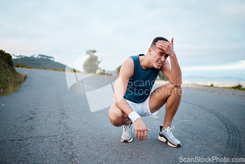 Image of Fitness, tired or man on break in running training, cardio workout and exercise outdoors. Runner breathing, sports or athlete exhausted with fatigue resting to recover energy in marathon race on road