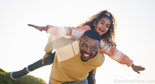 Image of Dad, girl child and piggy back for airplane on holiday, garden or outdoor in summer, bonding or playful. Father, kid and happy for game, love or care in backyard, park or nature for plane in sunshine
