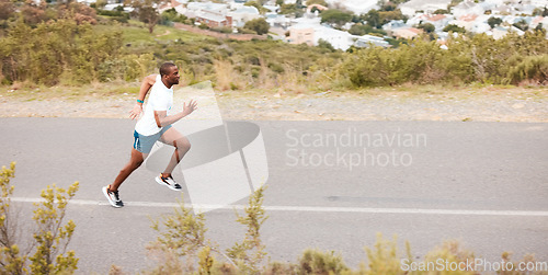 Image of Morning, road and a black man running for fitness, exercise and training for a marathon. Sports, health and an African runner or fast person in the street for a workout, cardio or athlete commitment