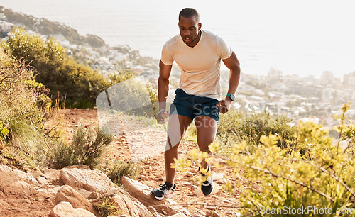 Image of Fitness, trail or runner running on mountain by nature for exercise, training or outdoor workout. Sports race, fast black man or healthy active athlete on hill with endurance, freedom or challenge