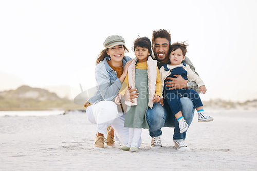 Image of Happy family, portrait and children with parents on beach, vacation or travel to Rio de Janeiro with happiness or freedom. Face, smile and young kids with mom and dad in summer, holiday or nature