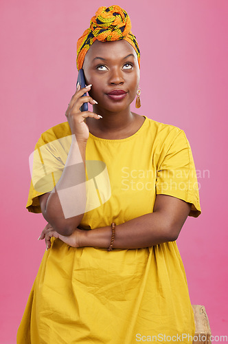 Image of Face, phone call and black woman in studio frustrated by phishing, scam or telemarketing spam on pink background. Smartphone, conversation and African female with eye roll emoji or annoyed attitude
