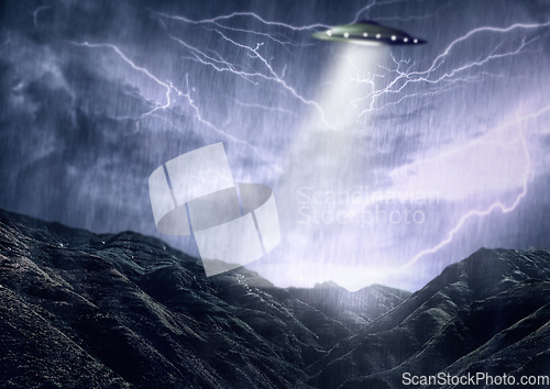 Image of Alien, spaceship and UFO with lightning on mountain for fantasy, science fiction and space abduction. Extraterrestrial, travel and flying saucer beam in rain for universe discovery, mystery or galaxy