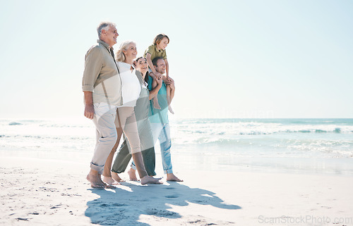 Image of Walking, beach and big family together on vacation, holiday or tropical weekend trip with love. Happy, travel and child with parents and grandparents bonding by ocean or sea on adventure in Australia