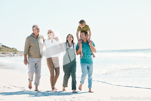 Image of Walking, beach and family generations together on vacation, holiday or tropical weekend trip. Happy, travel and child with parents and grandparents bonding by ocean or sea on adventure in Australia.