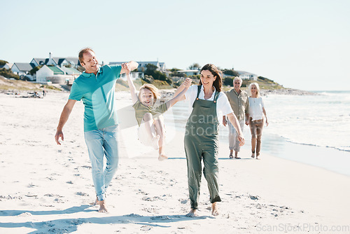 Image of Walking, adventure and family generations on a beach together on vacation, holiday or weekend trip. Happy, travel and child with parents and grandparents bonding by ocean or sea in Australia.