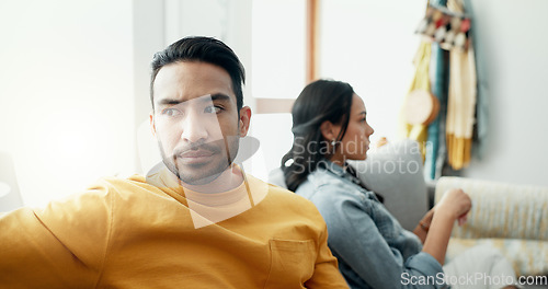 Image of Couple, fight and angry in home for divorce, breakup and ignore partner in bad argument on sofa. Asian man, woman and thinking of stress, conflict and drama of cheating, mistake or toxic relationship