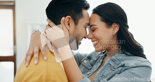 Image of Couple, forehead touch and hug in living room with love, bonding and happy people together at home. Healthy relationship, trust and support in commitment, partner and dancing, romance and intimacy