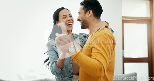 Image of Couple, dancing in living room and love, bonding and happy people together at home. Healthy relationship, trust and support in commitment, partner and marriage, romance and intimacy with laughter