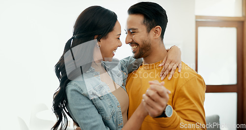 Image of Dance, happy and a couple in a house for romance, love or support together. Funny, smile and a laughing man and woman with fun, honeymoon and bonding in a living room for a date, care or affection