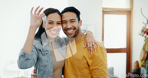 Image of Love, keys and excited with couple in new house for moving, real estate and investment. Property, happy and future with portrait of man and woman at home for opportunity, success or marriage together