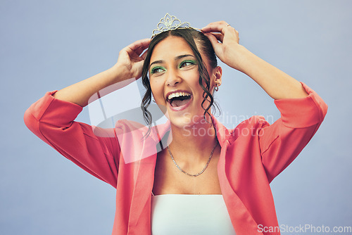 Image of Beauty, excited and woman with crown in studio for glamour, luxury and winning prize. Fashion, wow and isolated person with tiara for princess winner, pageant and cosmetics on purple background