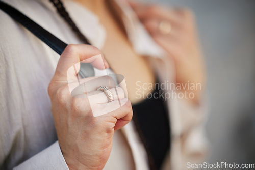 Image of Hand, bag for travel and a tourist closeup on holiday or vacation at the start of her journey for sightseeing. Backpack, commute and getaway for tourism with a person alone overseas or abroad