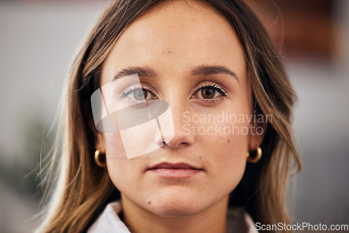 Image of Serious face, business woman and portrait in startup company, office and workplace. Designer, creative professional and confident female entrepreneur, worker and employee in Australia for career.