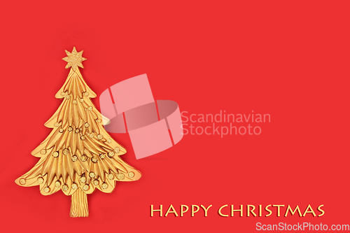 Image of Happy Christmas with Gold Tree on Red Background
