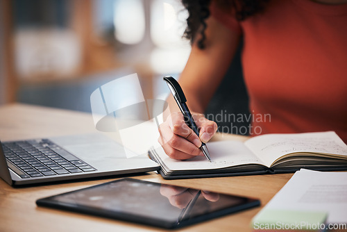 Image of Notebook, pen and hands of person writing notes, schedule or event planner working on project agenda. Laptop, tablet and closeup worker planning checklist, journal or research plan, list or ideas