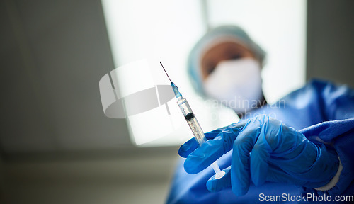 Image of Needle in hand, medicine and doctor person, healthcare and low angle with closeup, surgeon and anesthesia. Mockup space, syringe and gloves for safety, hospital and surgery with medical professional