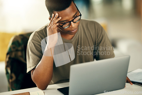 Image of Black man, laptop and soldier with headache in stress, mental health or burnout from thinking at home. Frustrated male person with migraine on computer, war or anxiety with debt, online or documents