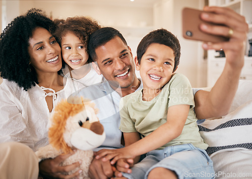 Image of Family, home selfie and living room with a smile, mom and child together with love. Bonding, sofa and happy father with a young children and mother with photo for social media post with kids at house